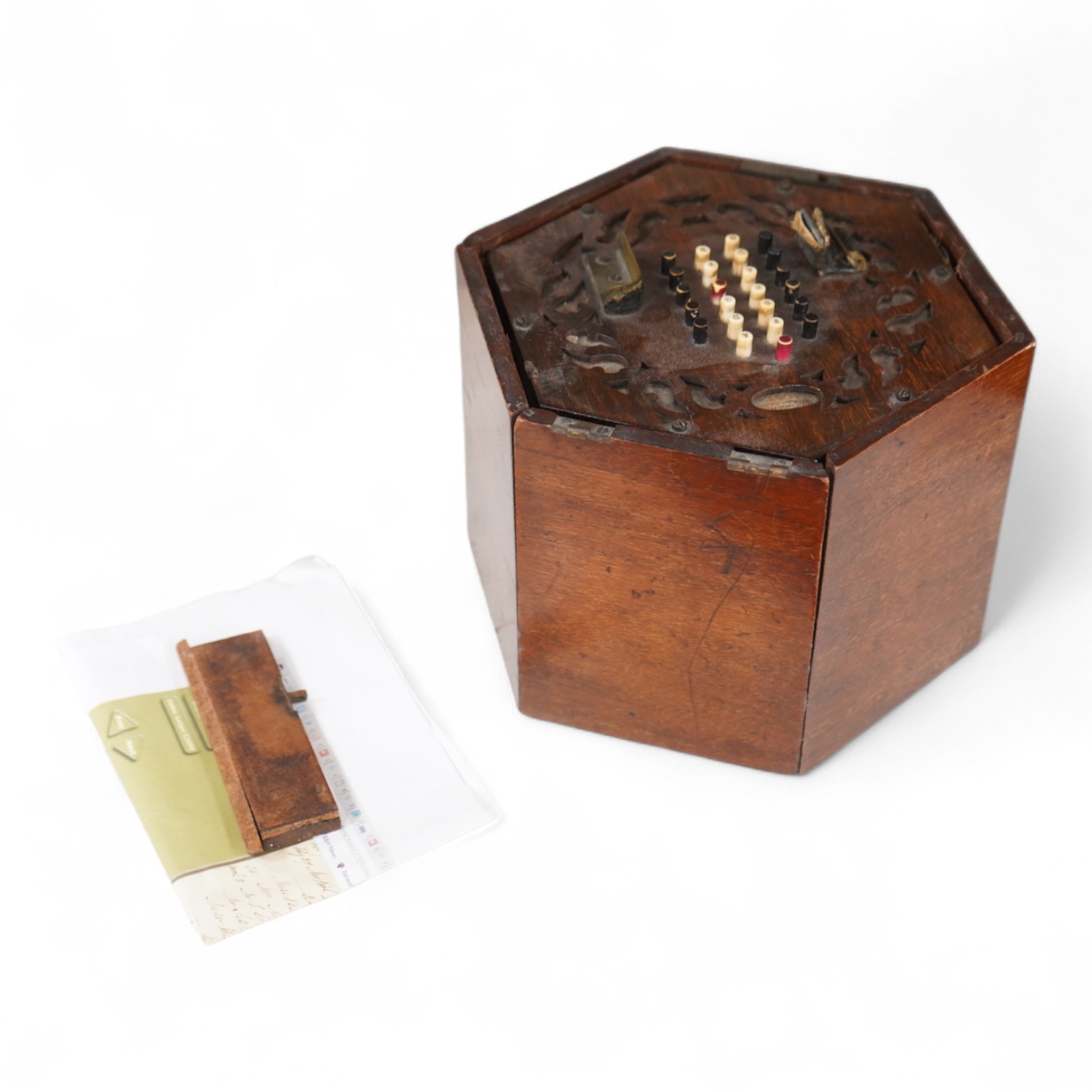 A Wheatstone mahogany cased 48 key rosewood and leather and paper bellows concertina, 18cm wide